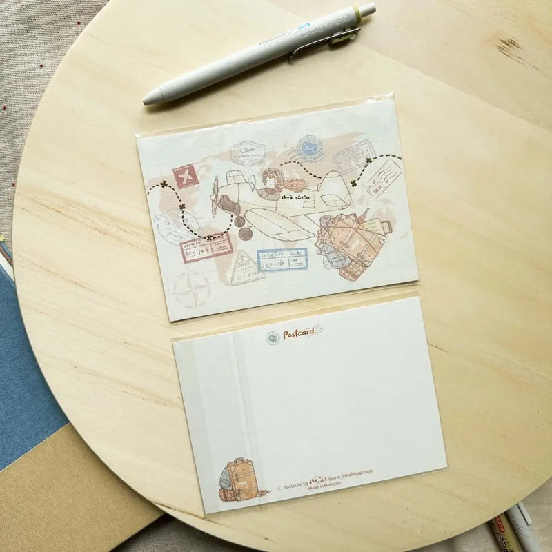 shō Little Happiness Postcard - Let's Go Traveling