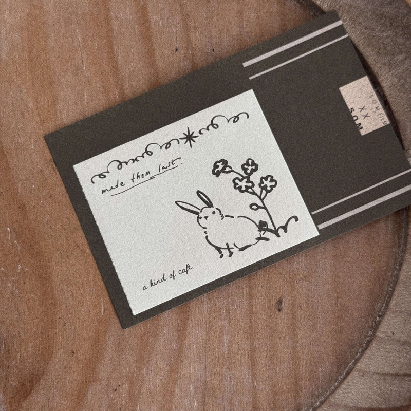 som × a kind of café Perforated Memo Pad: Gentle Rabbit Duo