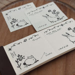 som × a kind of café Perforated Memo Pad: Gentle Rabbit Duo