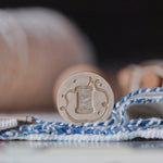 mossland Living inspired Wax Seal - A spool of thread